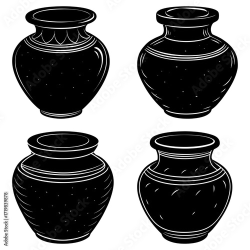 Collection of four black and white vases with different designs and shapes arranged in a square pattern