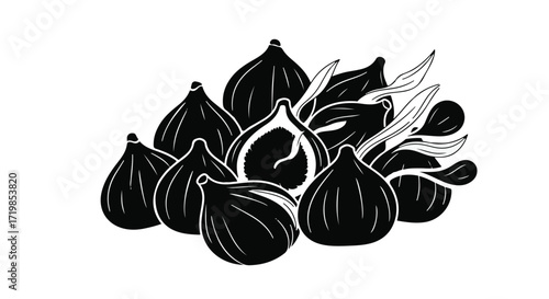 Fresh ripe figs artfully arranged with leaves on a clean white background