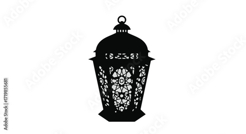 Elegant black silhouette of a decorative lantern with intricate patterns, symbolizing light and tradition.
