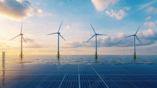 Offshore Wind Turbines with Floating Solar Panels at Sunset Hybrid Renewable Energy.
