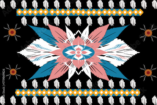 A bold tribal-inspired design featuring a radiant floral starburst in pink, blue, and white, set against a striking black background. Accented with geometric borders and sun-like motifs.