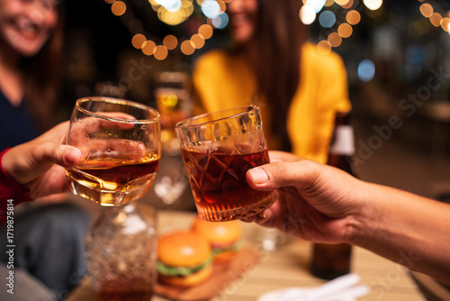 Wallpaper Mural Celebrate whisky at an intimate party at a camping restaurant. group celebration.	 Torontodigital.ca