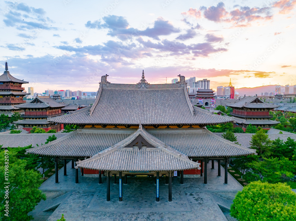 Fototapeta premium Aerial photography of Huayan Temple in Datong, Shanxi, China on a sunny summer day with fiery clouds