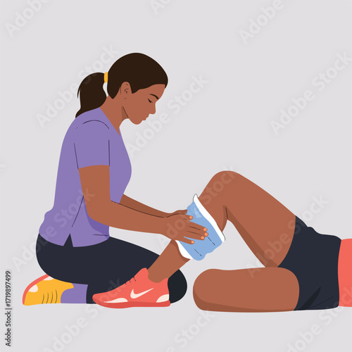 Woman applying ice pack on knee