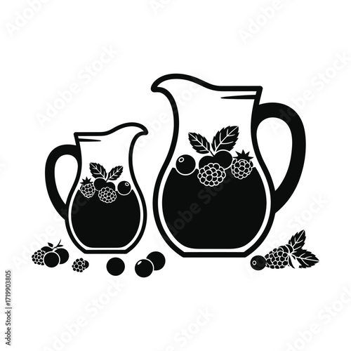 Two pitchers filled with berry juice and decorated with fresh berries and mint leaves
