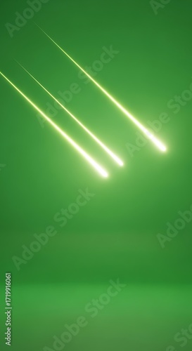 Three bright, luminous streaks of light, like shooting stars, against a uniform, solid green background.