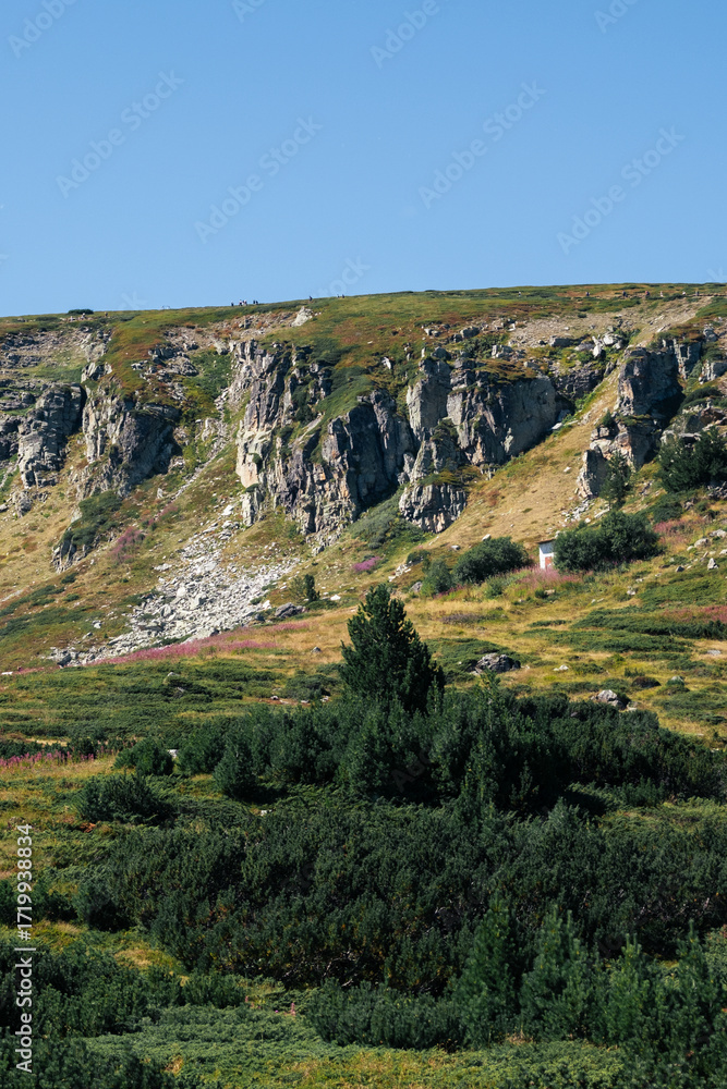 Fototapeta premium Mountain view of the Rila Mountains in Bulgaria. Seven Rila Lake hike. Eco trails. Connection with nature.