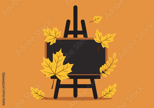 An autumn blackboard easel decorated with fallen leaves in warm tones for seasonal displays.