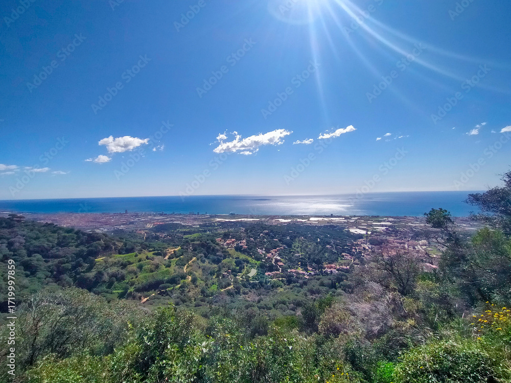Fototapeta premium sunset in the mountains views of the Mediterranean Sea near Mataró, Cabrera de Mar, Vilassar de Mar from the Burriac Castle, in Cabrera de Mar, Maresme.