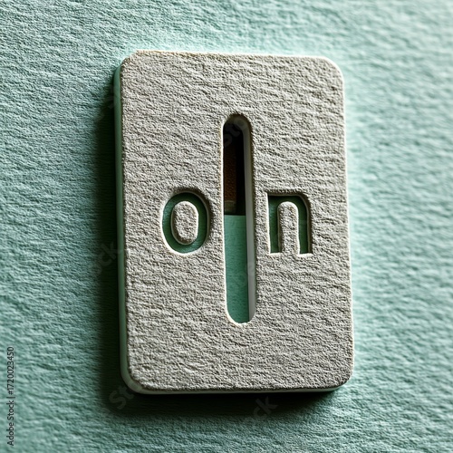 Minimalist Light Switch Design with Engraved On-Off Symbols in Soft Colors