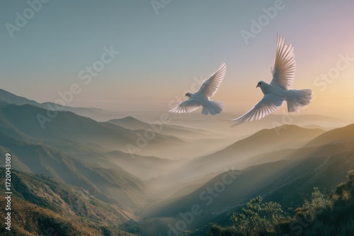 Wallpaper Mural serene landscape with sunrise over mountain valley, white doves flying above, soft mist in background, peaceful morning vibe, no text. Torontodigital.ca
