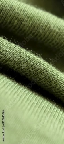 Vertical CloseUp Textures of Soft and Beautiful Green Knit Fabric for Various Uses