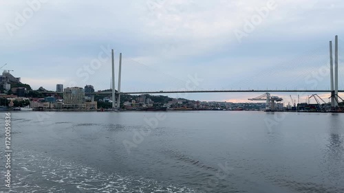 A boat ride along the Vladivostok embankment. View of the bridge.