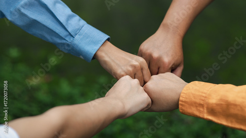 Environmental concept, business people join forces on World Environment Day and global community teamwork the global environment, society and environment CSR and sustainable development.