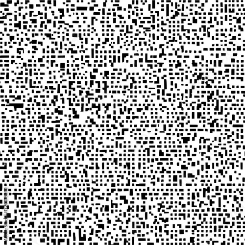 Dense arrangement of small black rectangles scattered across a white background creating a complex pattern