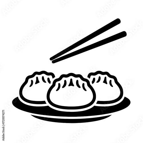 Steamed dumplings on a plate with chopsticks, culinary mood, in a minimalist design, copy space