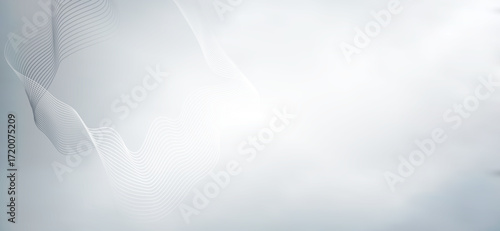 Flowing gray lines create a serene and elegant background on a gradient light gray backdrop, offering a minimalist abstract design suitable for various creative projects