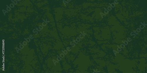 Grunge pattern of green and brown military camouflage fabric texture for a vintage decorative background