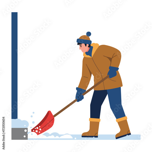 Man shoveling snow near a building in winter.