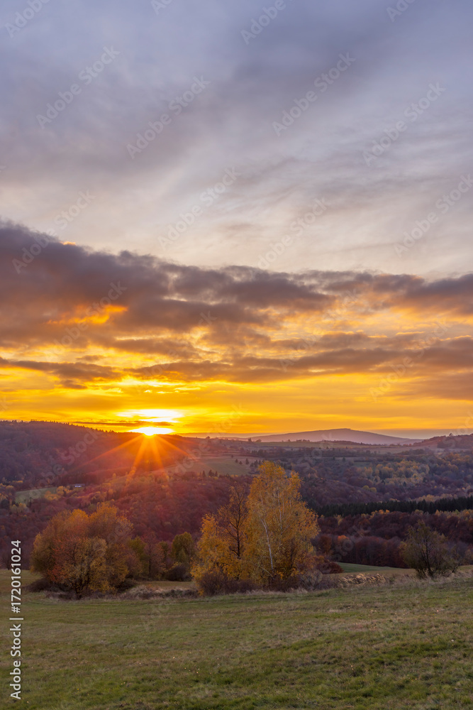 Obraz premium Golden sunset and colorful autumn foliage in National park Polana mountains, Slovakia