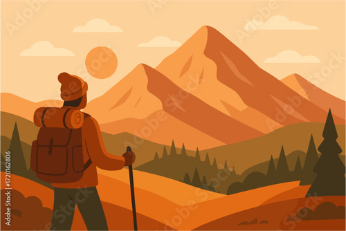 Hiker admiring mountain landscape at sunset in warm tones