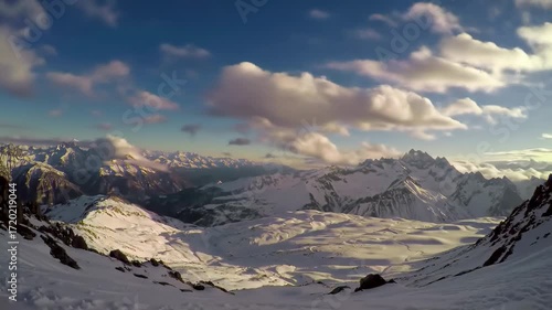 Snowy mountain peaks at sunrise