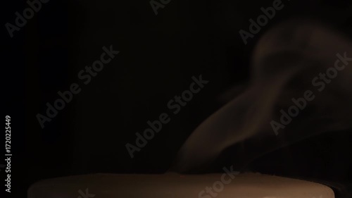 Old dusty candle in the dark