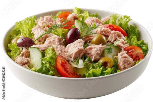 Fresh tuna salad with lettuce, tomatoes, and olives in white bowl, cut out