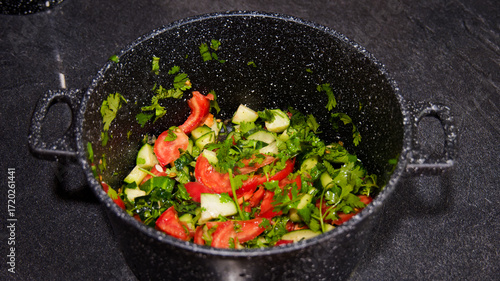 Cucumber tomato salad in the pot