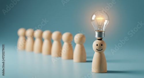 A lone wooden figure with a smiling face and a glowing lightbulb on its head stands out among a group of identical figures in a row on a blue background