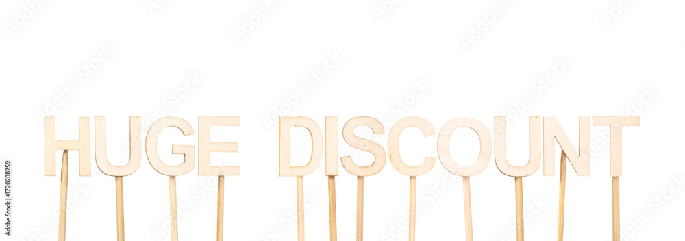 Fototapeta premium Wooden sign with the text Huge Discount, designed to communicate large discounts and final sales