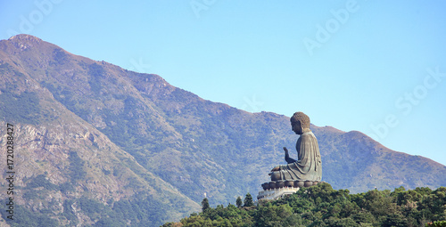 Photography Tian Tan Buddha( the Big Buddha ) at  Po Lin Monastery Lantau Island, Hong Kong with beautiful sierra and blue sky background