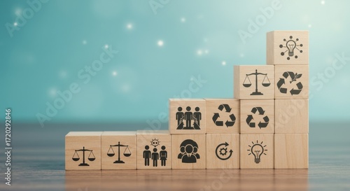 Sustainability icons on wooden blocks arranged in a staircase formation on a wooden surface against a blue background with white dots
