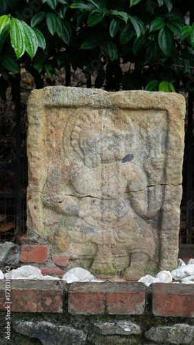 An ancient  sculpture of the Hindu god and goddess carved in stone
