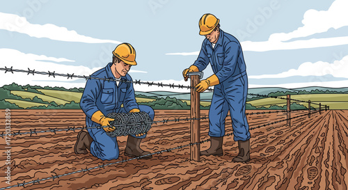 Two construction workers installing barbed wire fence in a field