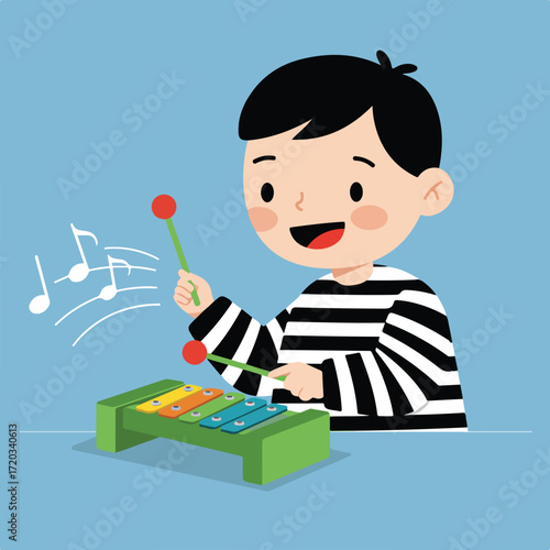 Boy playing a green xylophone with mallets, producing music notes on blue bg