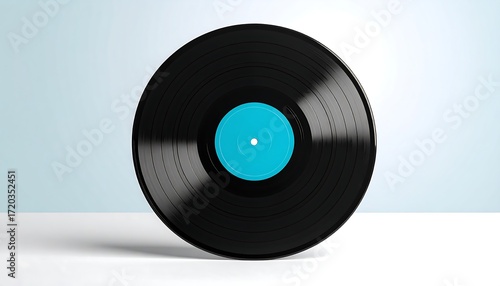 Black vinyl record with teal label