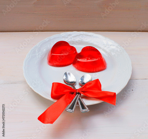 Romantic dessert: red gelatin hearts, love, date, engagement, Valentine's Day