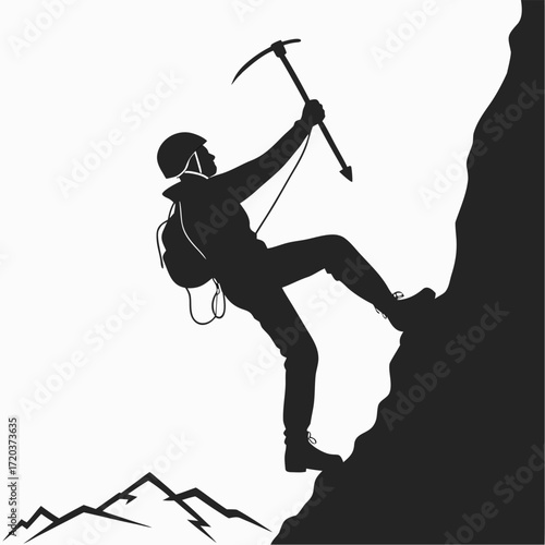 Climber scaling frozen waterfall silhouette