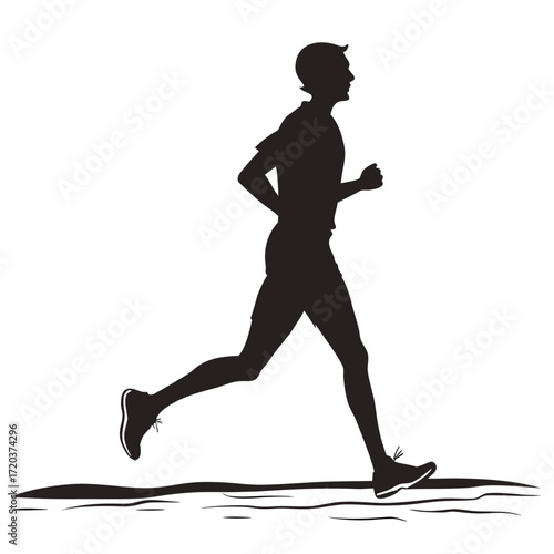 Runner jogging along beach silhouette