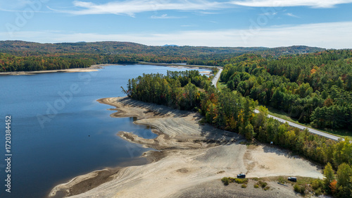 Aerial view of Moore Reservoir in Littleton, NH showing exposed shoreline during drought conditions.