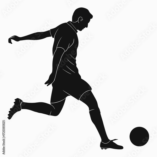 Soccer player taking penalty kick silhouette