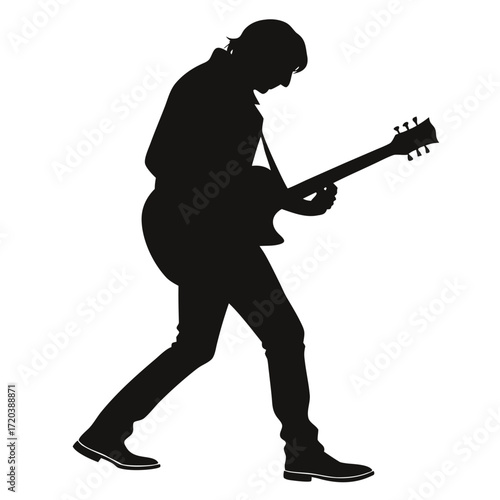 Street guitarist playing silhouette