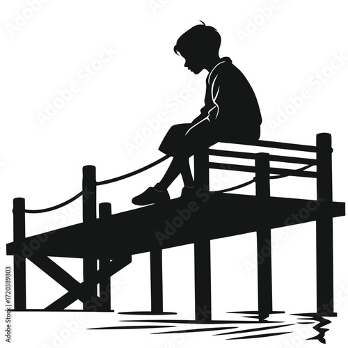 Boy sitting on pier silhouette