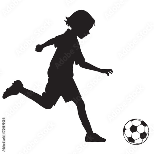 Child kicking soccer ball silhouette