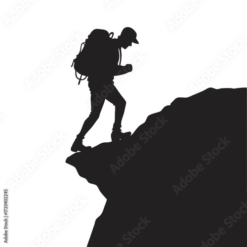 Hiker looking out from cliff silhouette