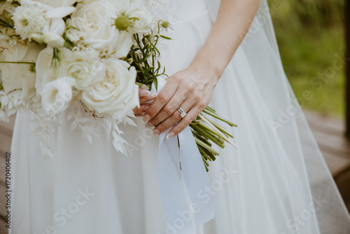 Cuadro en lienzo Close-up Bride Holding White Timeless and Romantic Bridal Bouquet with veil