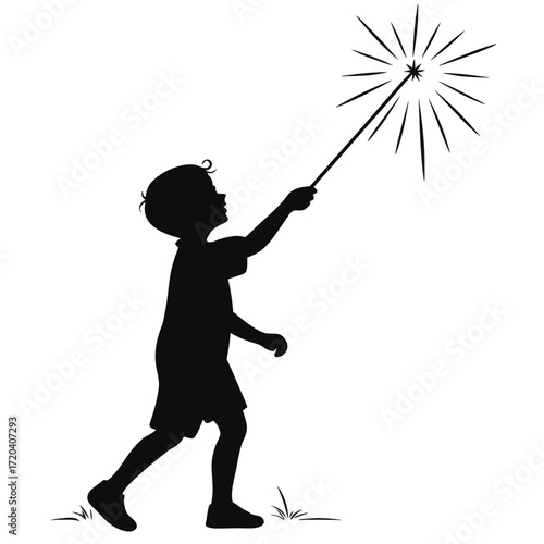 Child holding sparkler at night silhouette