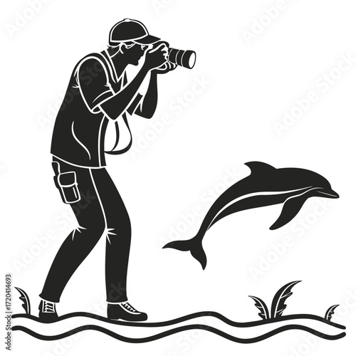 Photographer taking ocean photo silhouette