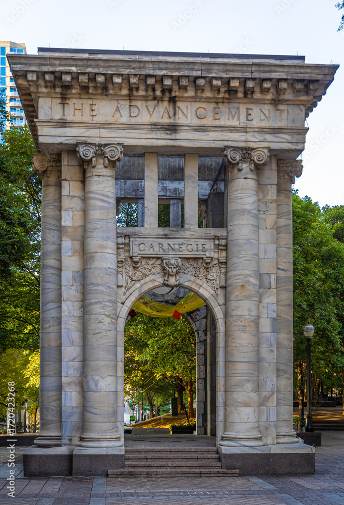 Obraz premium Carnegie stone arch monument in Atlanta with classical columns and engraved details